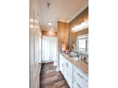 Built in 2018, this stunning custom home sits right on the #5 on Mystic Creek Golf Club in Arkansas - for sale on GolfHomes.com, golf home, golf lot
