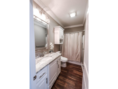 Built in 2018, this stunning custom home sits right on the #5 on Mystic Creek Golf Club in Arkansas - for sale on GolfHomes.com, golf home, golf lot