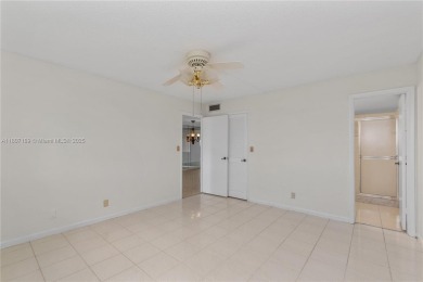 LUXURIOUS ISLAND STYLE 2BR/2BA with 17th hole PGA course green & on Hollybrook Golf and Tennis Club  in Florida - for sale on GolfHomes.com, golf home, golf lot