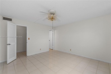 LUXURIOUS ISLAND STYLE 2BR/2BA with 17th hole PGA course green & on Hollybrook Golf and Tennis Club  in Florida - for sale on GolfHomes.com, golf home, golf lot