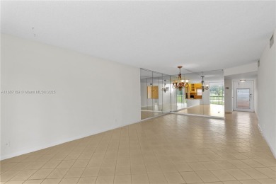 LUXURIOUS ISLAND STYLE 2BR/2BA with 17th hole PGA course green & on Hollybrook Golf and Tennis Club  in Florida - for sale on GolfHomes.com, golf home, golf lot