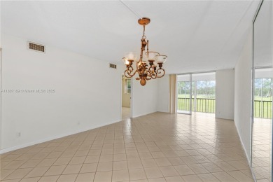 LUXURIOUS ISLAND STYLE 2BR/2BA with 17th hole PGA course green & on Hollybrook Golf and Tennis Club  in Florida - for sale on GolfHomes.com, golf home, golf lot