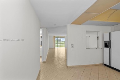 LUXURIOUS ISLAND STYLE 2BR/2BA with 17th hole PGA course green & on Hollybrook Golf and Tennis Club  in Florida - for sale on GolfHomes.com, golf home, golf lot