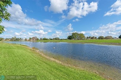 WOW! Do not miss immaculate  recent UPDATED open floor plan w/ on Heron Bay Golf Club in Florida - for sale on GolfHomes.com, golf home, golf lot