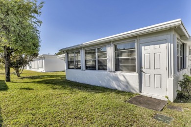 Pompano Beach 2BR 2BA in immaculate condition. Ha s1 Car Garage on Leisureville Community Association in Florida - for sale on GolfHomes.com, golf home, golf lot