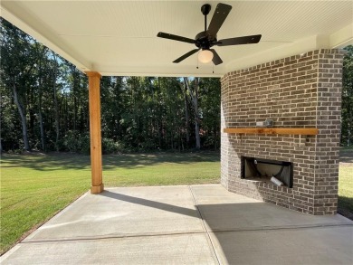 Stunning 2-story home with a 3rd car garage in a coveted on Traditions of Braselton Golf Club in Georgia - for sale on GolfHomes.com, golf home, golf lot