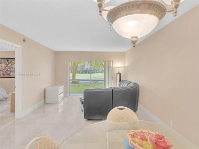 This 2-bedroom, 2 bath condo is perfectly situated on the first on Colony West Country Club in Florida - for sale on GolfHomes.com, golf home, golf lot