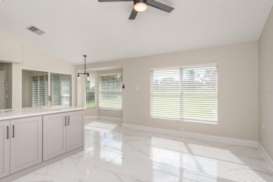 GORGEOUS REMODELED VILLA in TIMBER GREENS a vibrant 55+ golf on Timber Greens Country Club in Florida - for sale on GolfHomes.com, golf home, golf lot