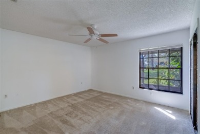 Enjoy the privacy and comfort of a large, split floorplan villa on Highland Lakes Executive Golf Course in Florida - for sale on GolfHomes.com, golf home, golf lot