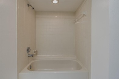 Enjoy the privacy and comfort of a large, split floorplan villa on Highland Lakes Executive Golf Course in Florida - for sale on GolfHomes.com, golf home, golf lot