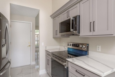 GORGEOUS REMODELED VILLA in TIMBER GREENS a vibrant 55+ golf on Timber Greens Country Club in Florida - for sale on GolfHomes.com, golf home, golf lot