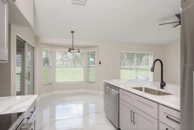 GORGEOUS REMODELED VILLA in TIMBER GREENS a vibrant 55+ golf on Timber Greens Country Club in Florida - for sale on GolfHomes.com, golf home, golf lot