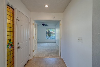 Enjoy the privacy and comfort of a large, split floorplan villa on Highland Lakes Executive Golf Course in Florida - for sale on GolfHomes.com, golf home, golf lot