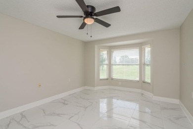 GORGEOUS REMODELED VILLA in TIMBER GREENS a vibrant 55+ golf on Timber Greens Country Club in Florida - for sale on GolfHomes.com, golf home, golf lot