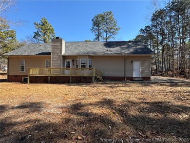 Welcome home to this charming 3 bedroom 2 bath ranch with a on Carolina Lakes Country Club in North Carolina - for sale on GolfHomes.com, golf home, golf lot