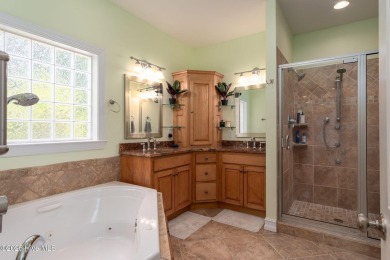 Refined Coastal Living in Hampstead. Discover timeless on Olde Point Golf and Country Club in North Carolina - for sale on GolfHomes.com, golf home, golf lot