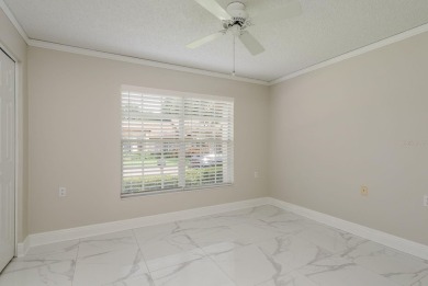 GORGEOUS REMODELED VILLA in TIMBER GREENS a vibrant 55+ golf on Timber Greens Country Club in Florida - for sale on GolfHomes.com, golf home, golf lot