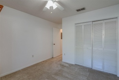 Enjoy the privacy and comfort of a large, split floorplan villa on Highland Lakes Executive Golf Course in Florida - for sale on GolfHomes.com, golf home, golf lot