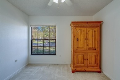 Enjoy the privacy and comfort of a large, split floorplan villa on Highland Lakes Executive Golf Course in Florida - for sale on GolfHomes.com, golf home, golf lot