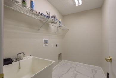 GORGEOUS REMODELED VILLA in TIMBER GREENS a vibrant 55+ golf on Timber Greens Country Club in Florida - for sale on GolfHomes.com, golf home, golf lot
