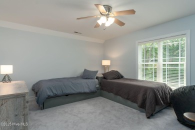 Refined Coastal Living in Hampstead. Discover timeless on Olde Point Golf and Country Club in North Carolina - for sale on GolfHomes.com, golf home, golf lot