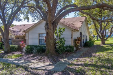 Enjoy the privacy and comfort of a large, split floorplan villa on Highland Lakes Executive Golf Course in Florida - for sale on GolfHomes.com, golf home, golf lot