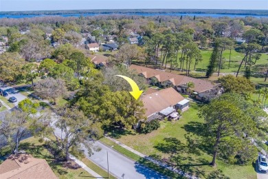 Enjoy the privacy and comfort of a large, split floorplan villa on Highland Lakes Executive Golf Course in Florida - for sale on GolfHomes.com, golf home, golf lot