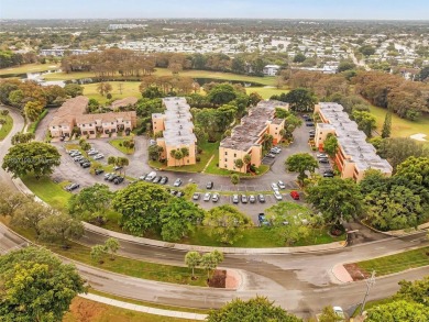 This 2-bedroom, 2 bath condo is perfectly situated on the first on Colony West Country Club in Florida - for sale on GolfHomes.com, golf home, golf lot