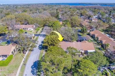 Enjoy the privacy and comfort of a large, split floorplan villa on Highland Lakes Executive Golf Course in Florida - for sale on GolfHomes.com, golf home, golf lot