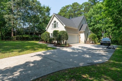 Refined Coastal Living in Hampstead. Discover timeless on Olde Point Golf and Country Club in North Carolina - for sale on GolfHomes.com, golf home, golf lot