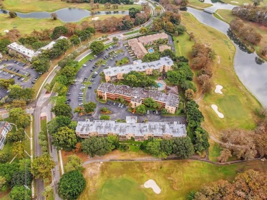 This 2-bedroom, 2 bath condo is perfectly situated on the first on Colony West Country Club in Florida - for sale on GolfHomes.com, golf home, golf lot