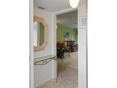 Welcome home to your Punta Gorda Isles retreat. This perfectly on Saint Andrews South Golf Club in Florida - for sale on GolfHomes.com, golf home, golf lot