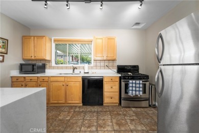 Just in time for summer! Don't miss this wonderfully upgraded on Heartwell Golf Course in California - for sale on GolfHomes.com, golf home, golf lot