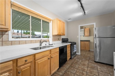 Just in time for summer! Don't miss this wonderfully upgraded on Heartwell Golf Course in California - for sale on GolfHomes.com, golf home, golf lot
