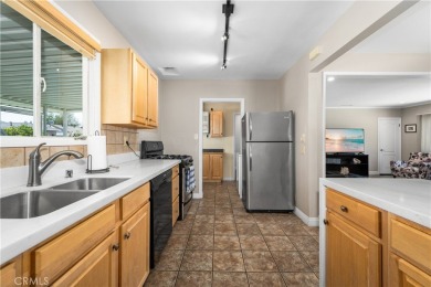 Just in time for summer! Don't miss this wonderfully upgraded on Heartwell Golf Course in California - for sale on GolfHomes.com, golf home, golf lot