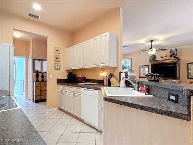 Rare Egret model home, a variation of the popular Sandpiper on Herons Glen Golf and Country Club in Florida - for sale on GolfHomes.com, golf home, golf lot