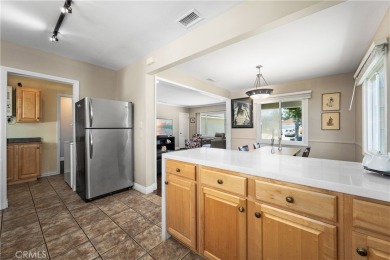 Just in time for summer! Don't miss this wonderfully upgraded on Heartwell Golf Course in California - for sale on GolfHomes.com, golf home, golf lot