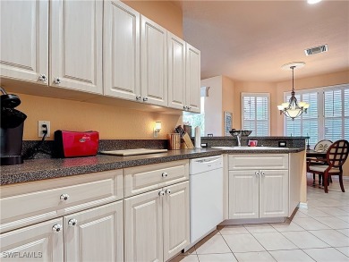 Rare Egret model home, a variation of the popular Sandpiper on Herons Glen Golf and Country Club in Florida - for sale on GolfHomes.com, golf home, golf lot