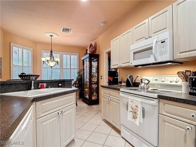 Rare Egret model home, a variation of the popular Sandpiper on Herons Glen Golf and Country Club in Florida - for sale on GolfHomes.com, golf home, golf lot