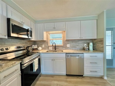 Under contract-accepting backup offers. Beautifully Updated Home on Fairway Village Golf Course in Florida - for sale on GolfHomes.com, golf home, golf lot