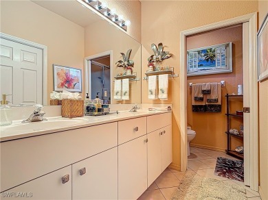 Rare Egret model home, a variation of the popular Sandpiper on Herons Glen Golf and Country Club in Florida - for sale on GolfHomes.com, golf home, golf lot