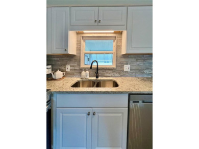 Under contract-accepting backup offers. Beautifully Updated Home on Fairway Village Golf Course in Florida - for sale on GolfHomes.com, golf home, golf lot