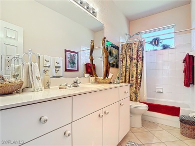 Rare Egret model home, a variation of the popular Sandpiper on Herons Glen Golf and Country Club in Florida - for sale on GolfHomes.com, golf home, golf lot