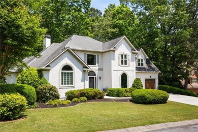 Fabulous retreat located in the heart of Towne Lake that offers on Canongate At Eagle Watch Golf Club in Georgia - for sale on GolfHomes.com, golf home, golf lot