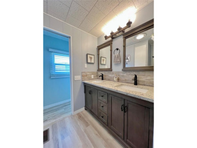 Under contract-accepting backup offers. Beautifully Updated Home on Fairway Village Golf Course in Florida - for sale on GolfHomes.com, golf home, golf lot