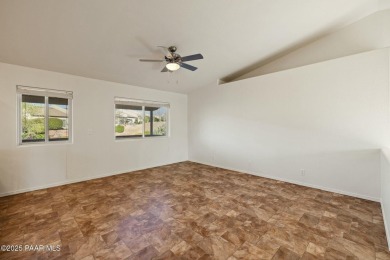 This warm and welcoming home is located in a  highly sought on Prescott Golf and Country Club in Arizona - for sale on GolfHomes.com, golf home, golf lot