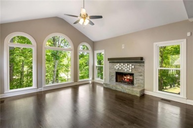 Fabulous retreat located in the heart of Towne Lake that offers on Canongate At Eagle Watch Golf Club in Georgia - for sale on GolfHomes.com, golf home, golf lot