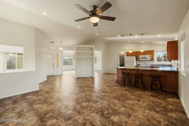 This warm and welcoming home is located in a  highly sought on Prescott Golf and Country Club in Arizona - for sale on GolfHomes.com, golf home, golf lot