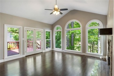 Fabulous retreat located in the heart of Towne Lake that offers on Canongate At Eagle Watch Golf Club in Georgia - for sale on GolfHomes.com, golf home, golf lot