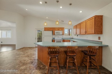 This warm and welcoming home is located in a  highly sought on Prescott Golf and Country Club in Arizona - for sale on GolfHomes.com, golf home, golf lot